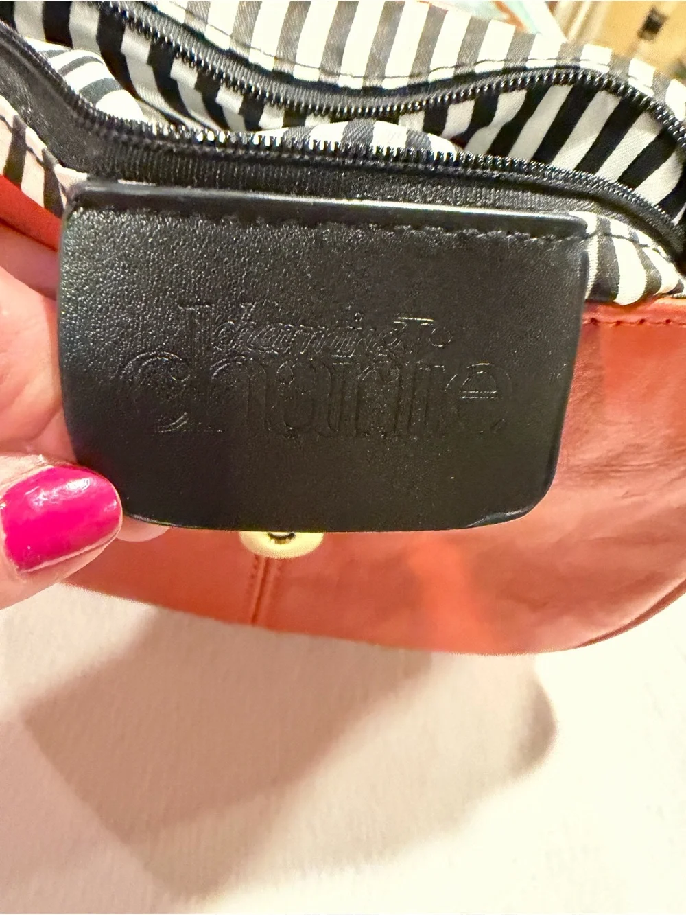 Crossbody Tassel Saddle Bag in pumpkin